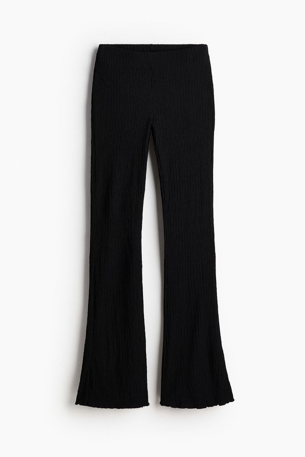 Leggings acampanados con textura