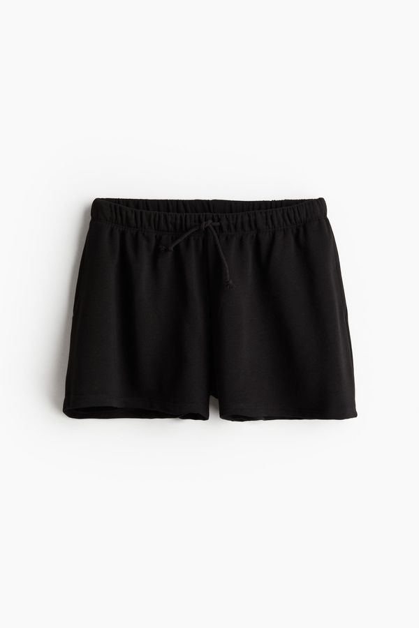 Pantalón corto en sudadera