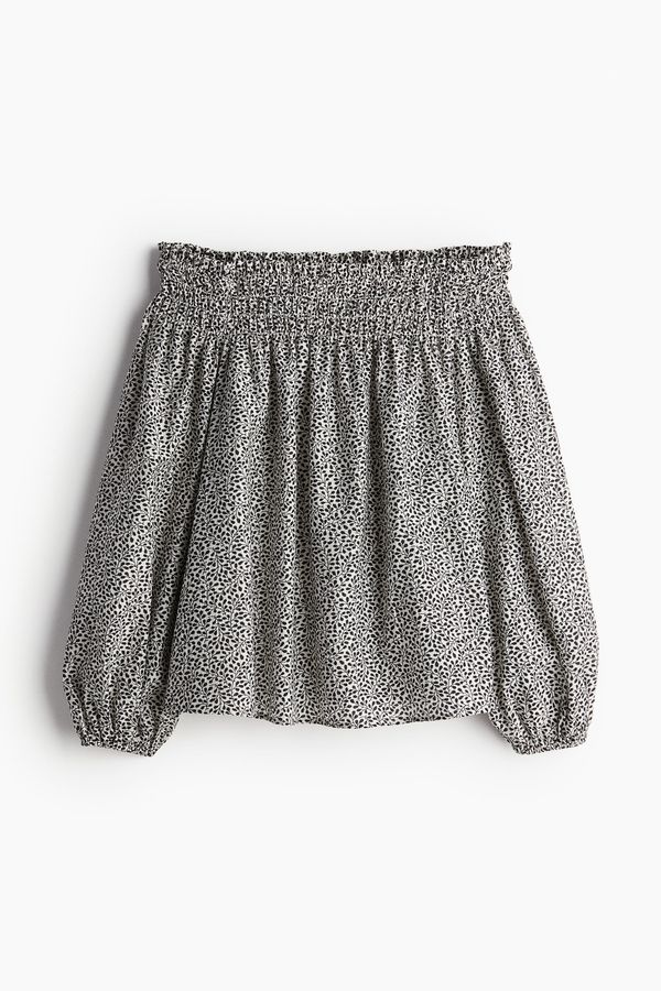 Blusa off-the-shoulder