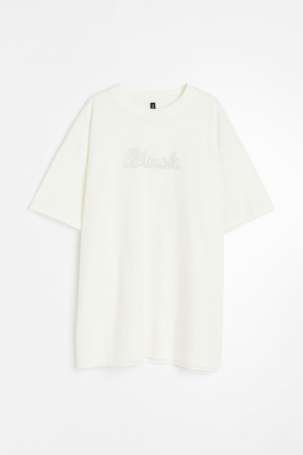 Camiseta oversize con cuentas