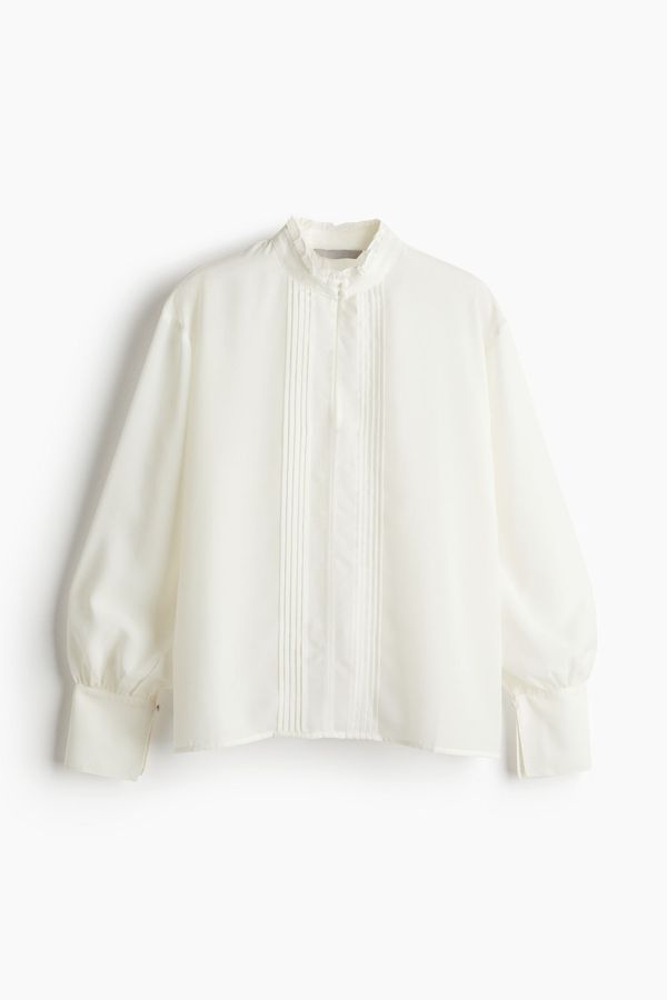 Blusa vaporosa con jaretas