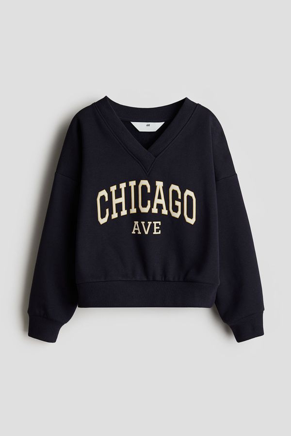 Sudadera con cuello de pico