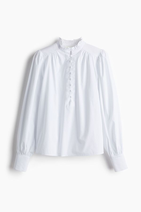 Blusa de algodón con cuello de volante