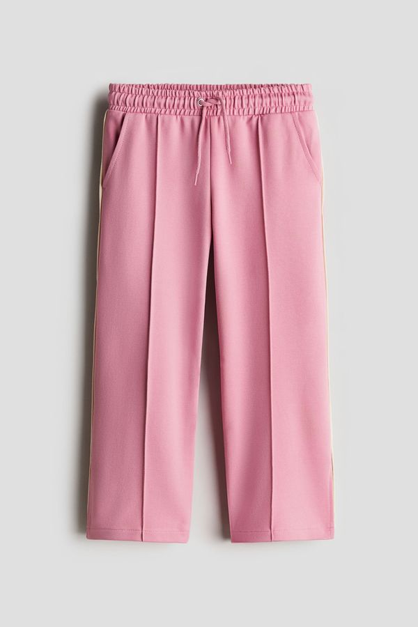 Pantalón amplio con raya