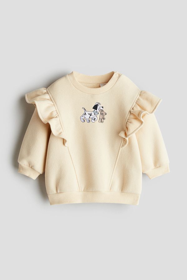 Sudadera con volantes
