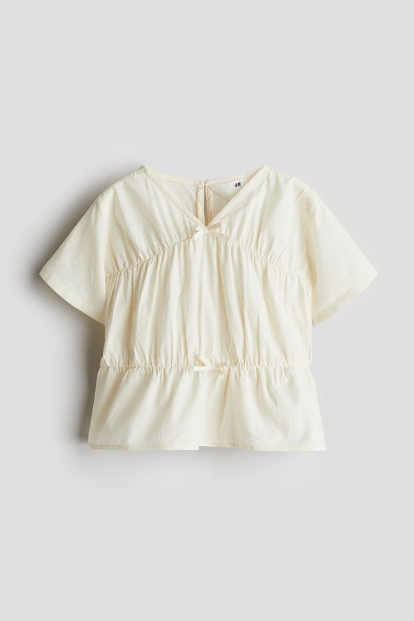 Blusa de algodón con peplo