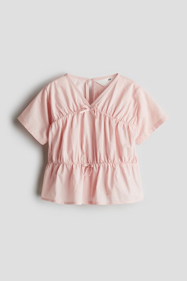 Blusa de algodón con peplo
