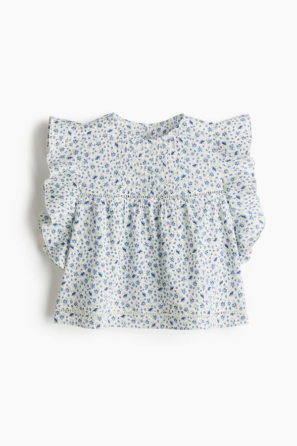 Blusa con manga circular