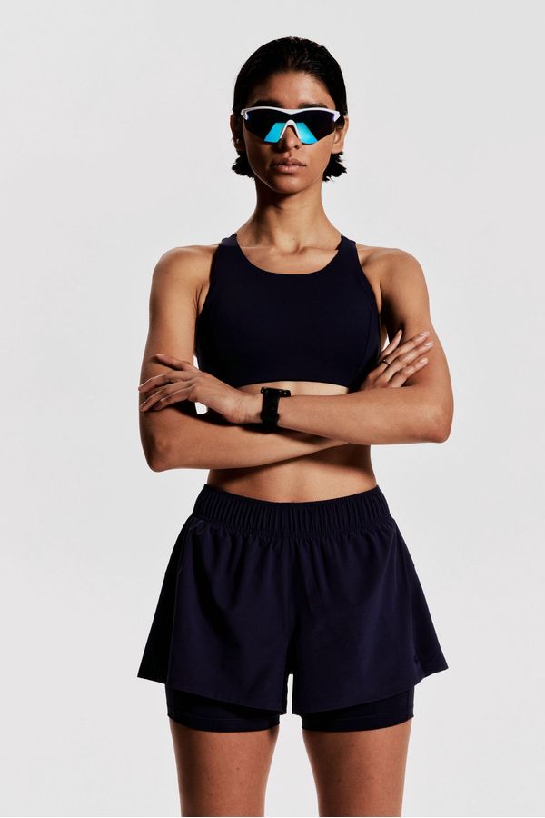 Pantalón corto de correr doble capa con DryMove™