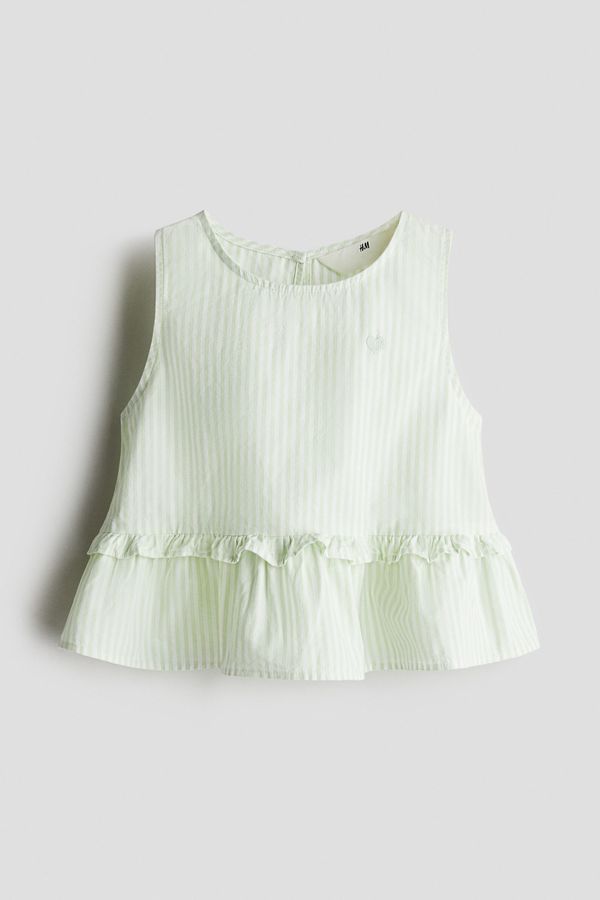 Blusa de algodón con peplo