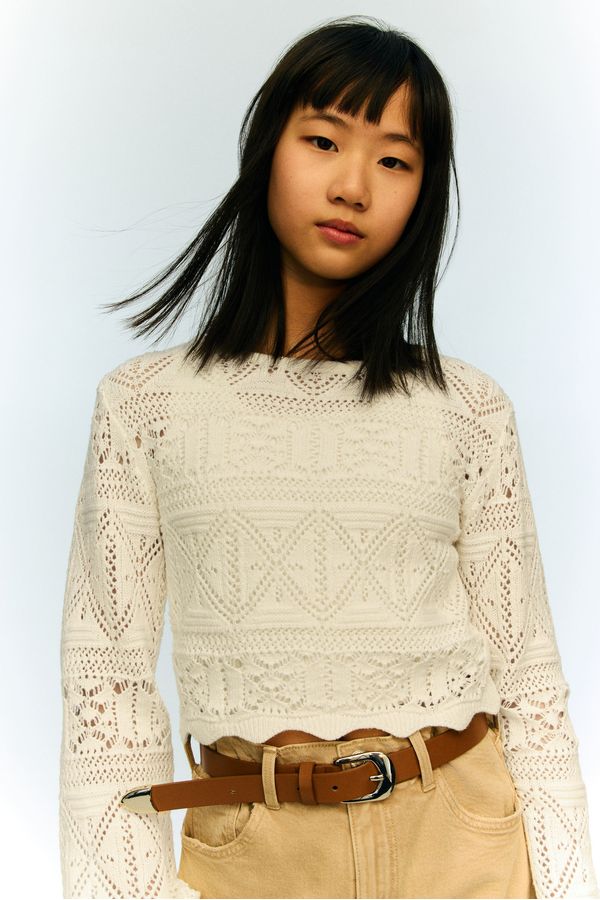 Top cropped en punto pointelle