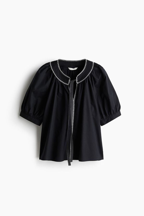 Blusa de popelina con lazada