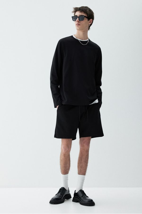 Pantalón corto en sudadera Regular Fit