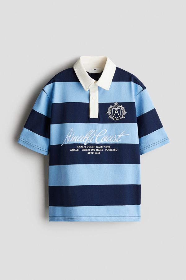 Polo con motivo de texto