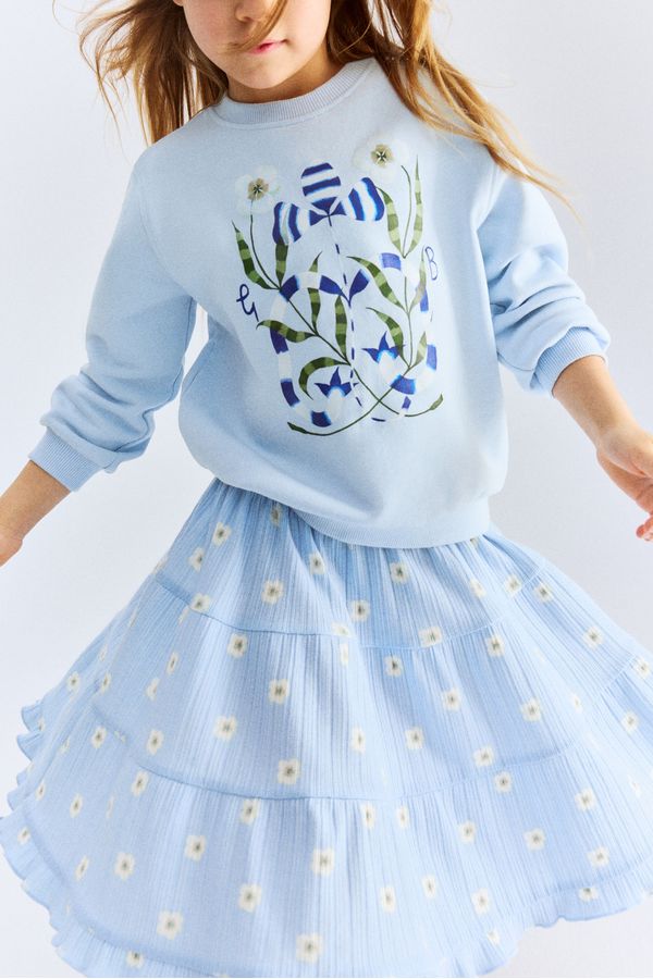 Falda estampada en pointelle