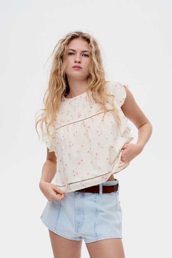 Blusa con manga circular