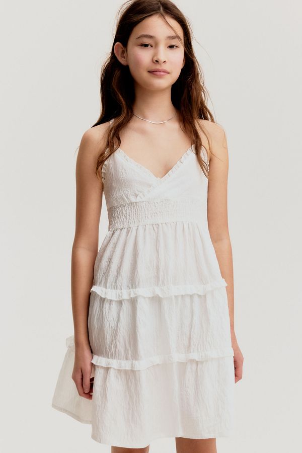 Vestido fruncido con volantes
