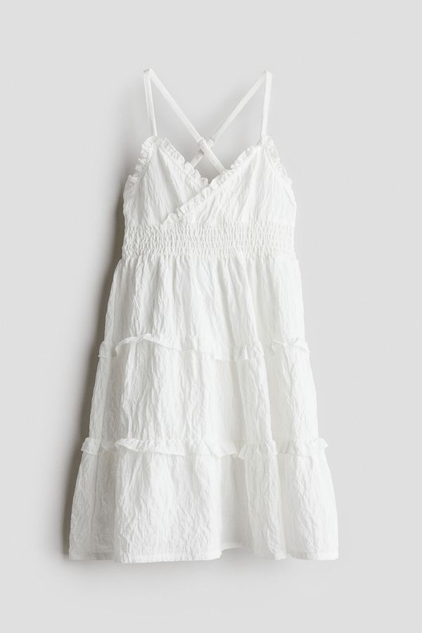 Vestido fruncido con volantes