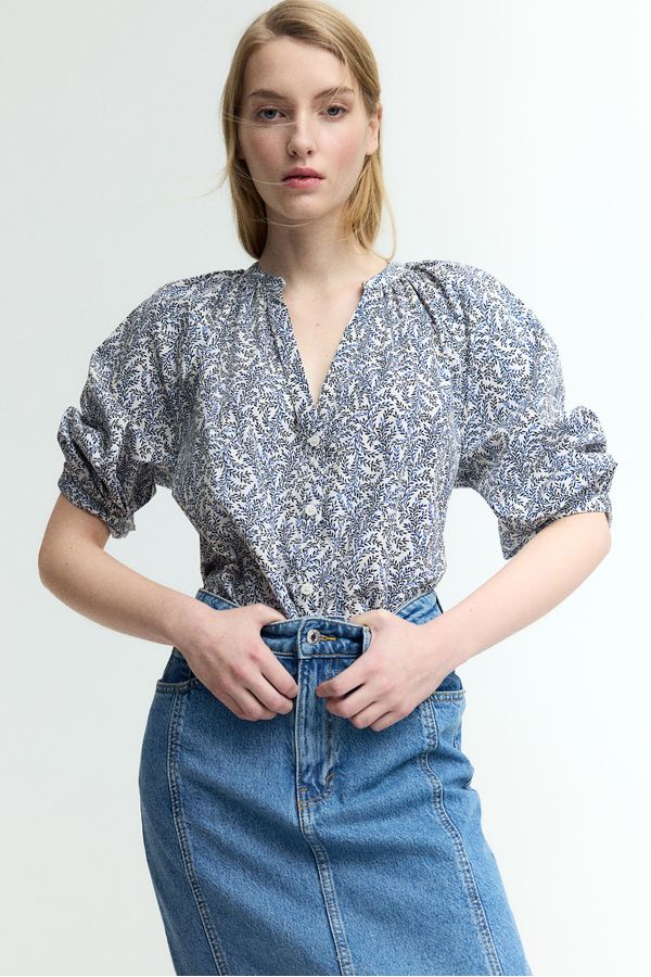 Blusa de popelina con mangas globo