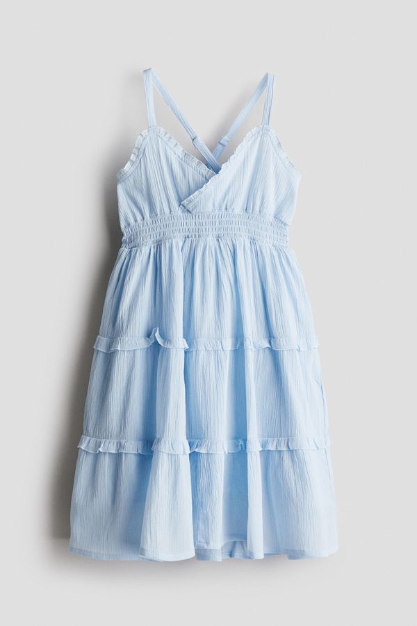 Vestido fruncido con volantes