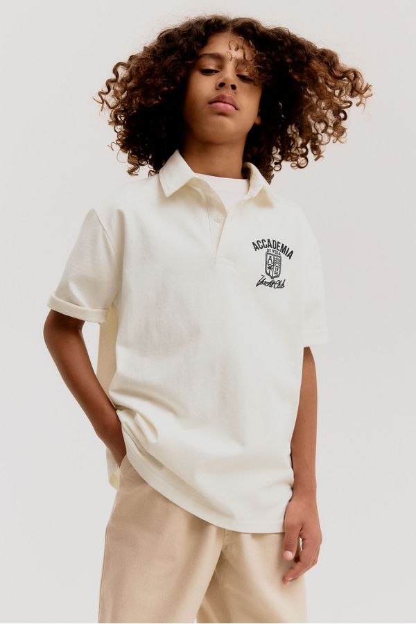 Polo con motivo de texto