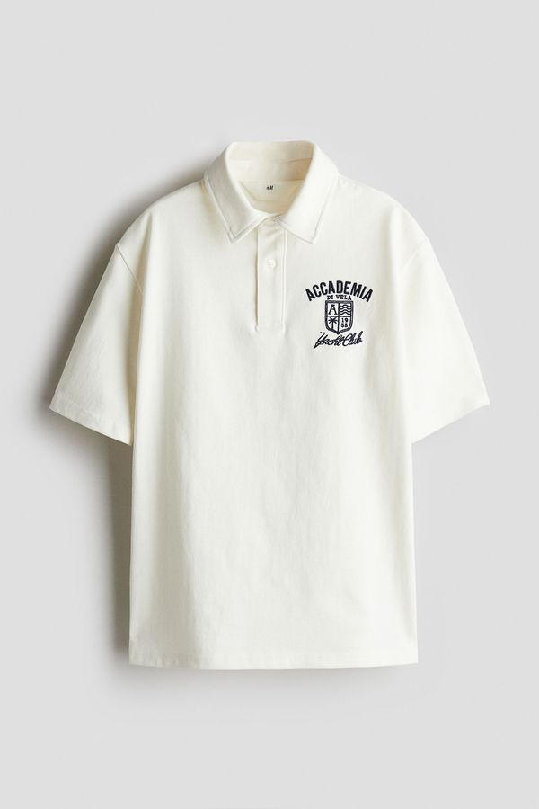 Polo con motivo de texto