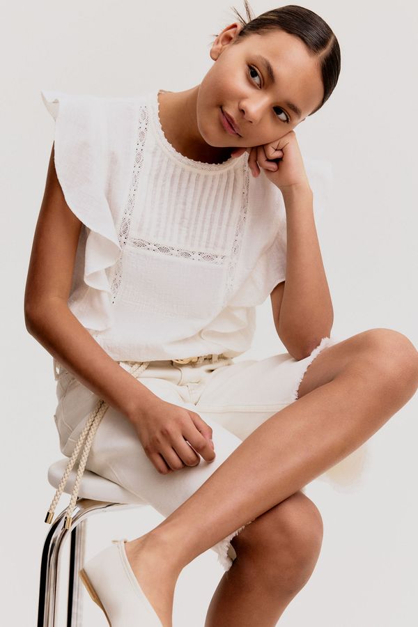 Blusa de algodón con volantes