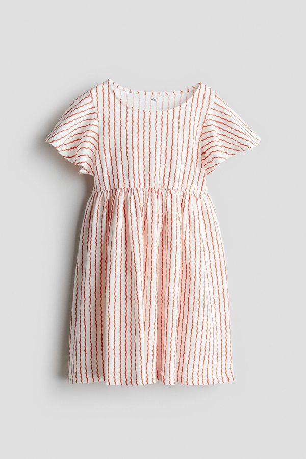 Vestido de algodón con manga circular