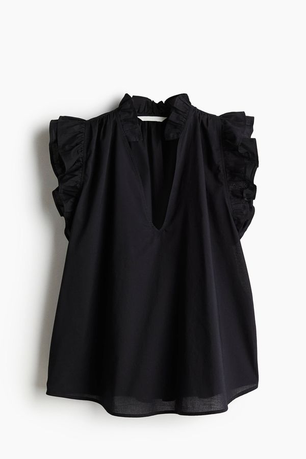 Blusa con ribetes de volante