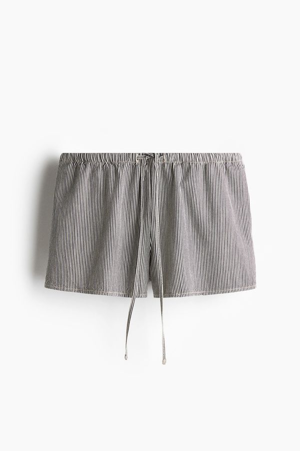 Pantalón corto con cordón de ajuste