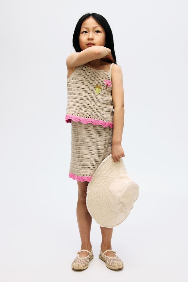 Conjunto de top y falda de punto