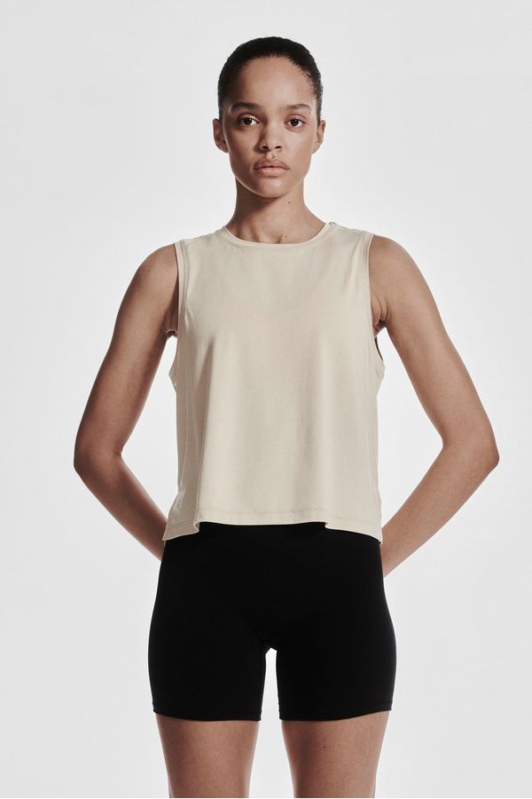 Camiseta de deporte boxy sin mangas con DryMove™