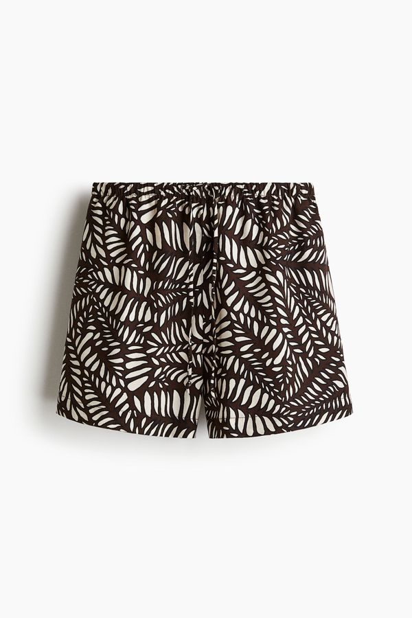 Pantalón corto con cordón de ajuste