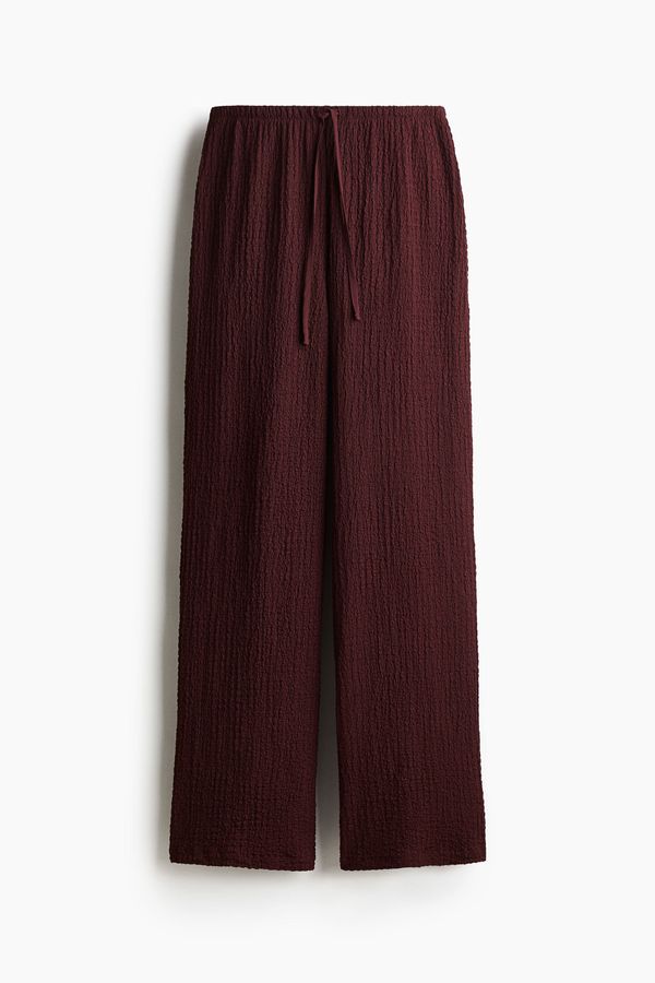 Pantalón efecto arrugado con cordón de ajuste