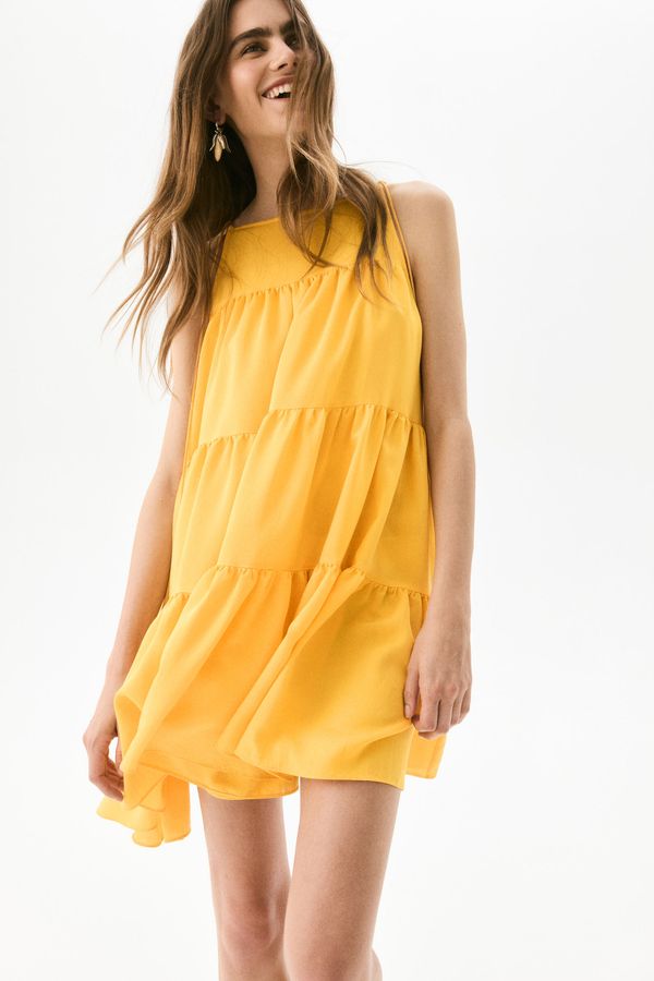 Vestido escalonado de corte evasé