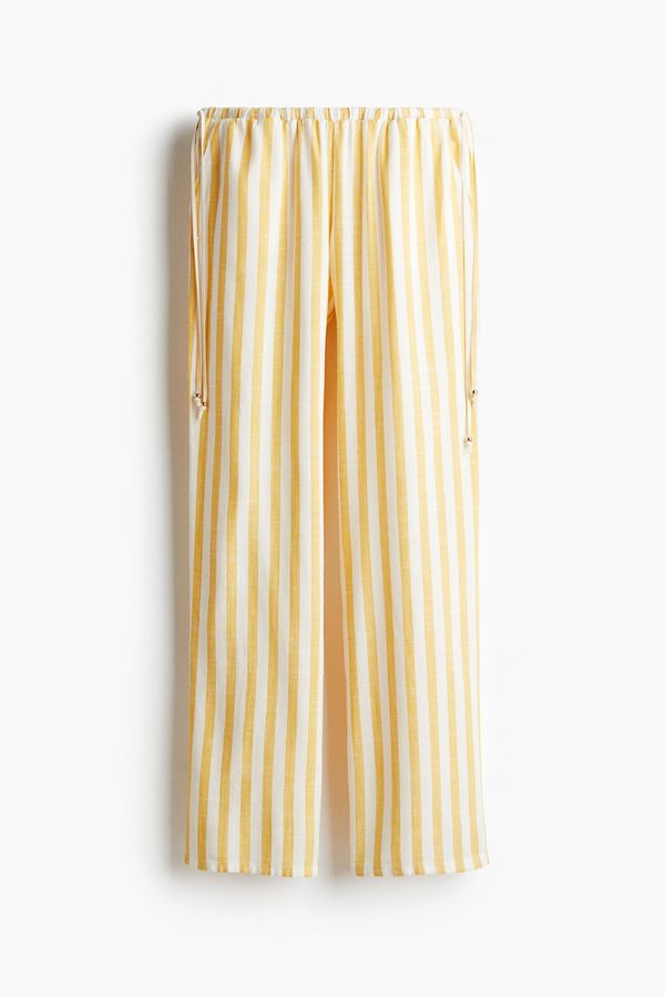 Pantalón amplio con cordón de ajuste