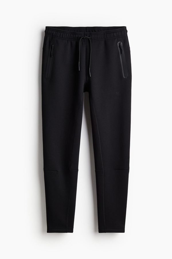 Joggers de deporte con DryMove™ Slim Fit