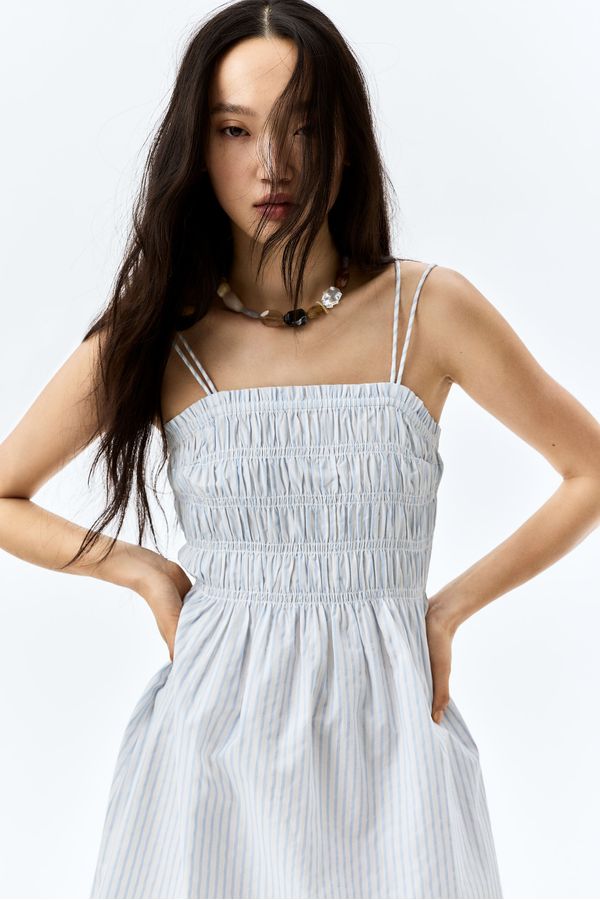 Vestido de algodón con cuerpo nido de abeja