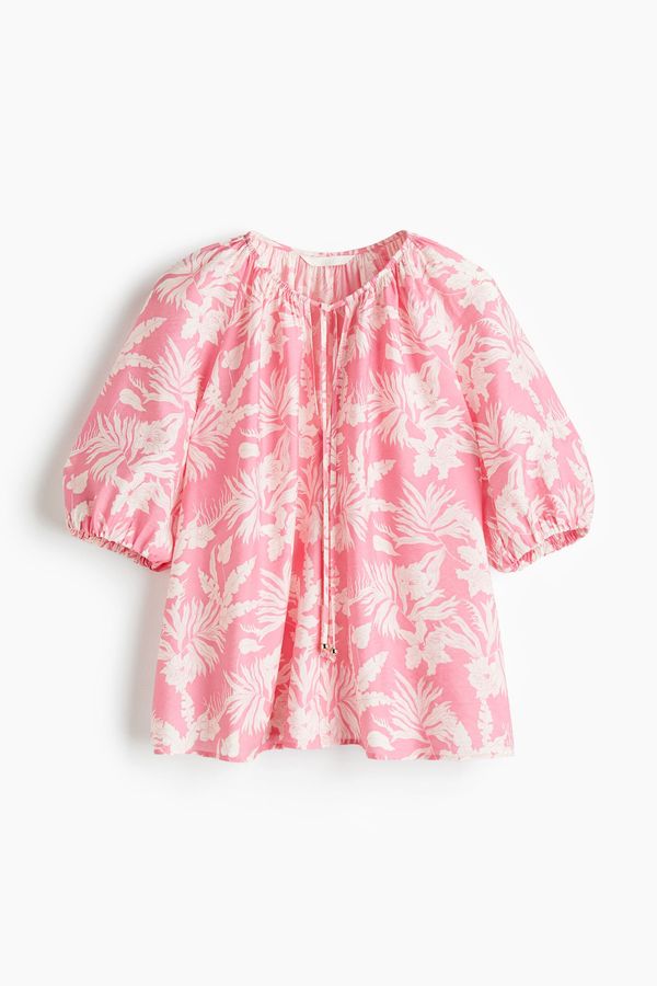 Blusa con mangas globo