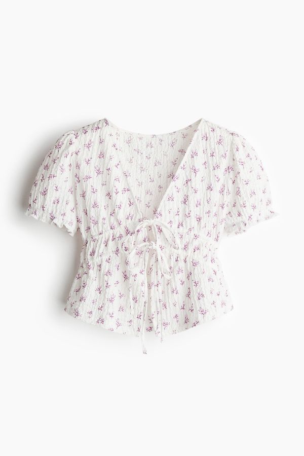 Top arrugado con lazada doble