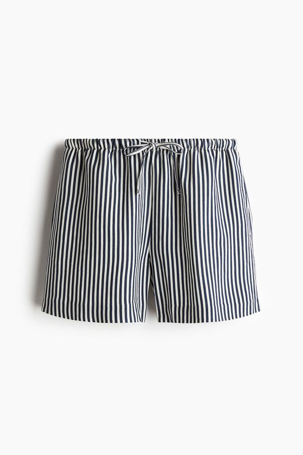 Pantalón corto en mezcla de lino