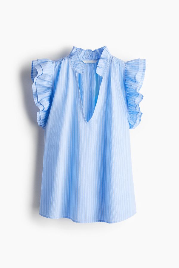 Blusa con ribetes de volante