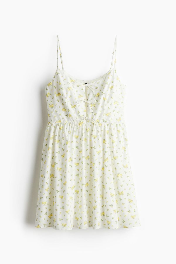 Vestido de popelina con lazadas