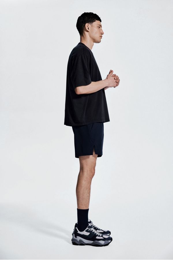 Pantalón corto a media pierna con DryMove™