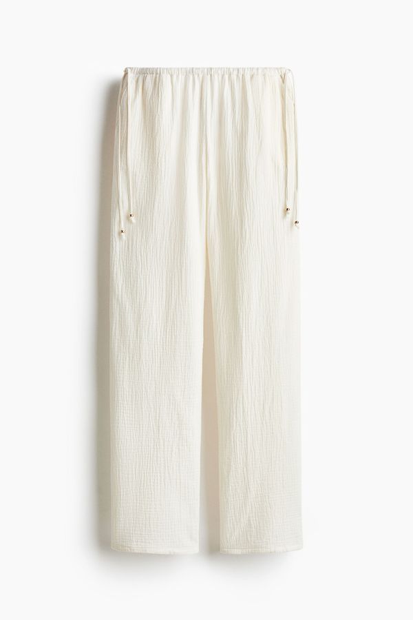 Pantalón amplio con cordón de ajuste