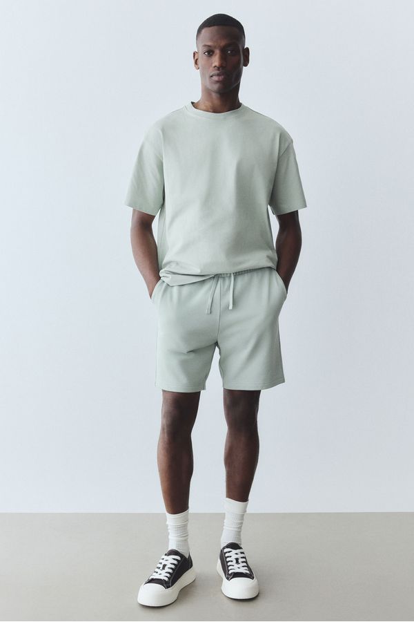 Pantalón corto en sudadera Regular Fit