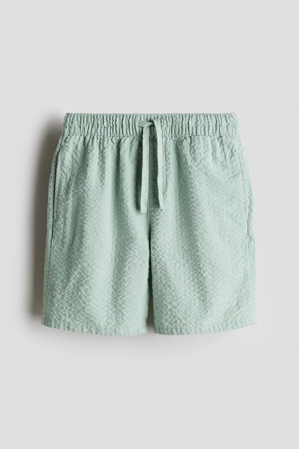 Pantalón corto en sirsaca de algodón