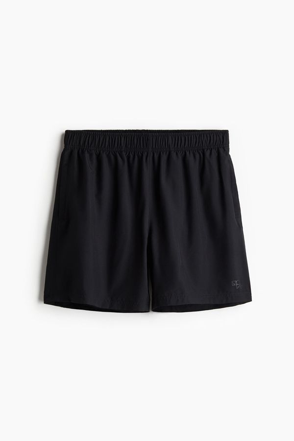Pantalón corto a media pierna con DryMove™
