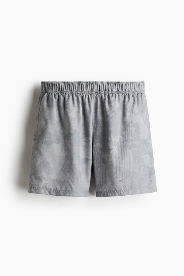 Pantalón corto a media pierna con DryMove™