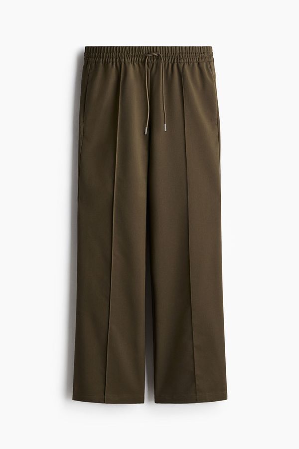 Pantalón con cordón ajustable y raya
